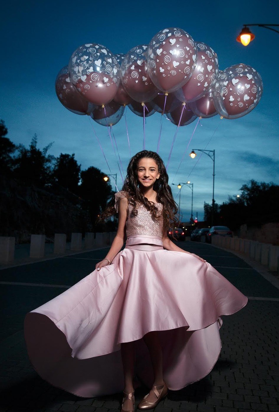 Bat Mitzvah girl with pink balloons