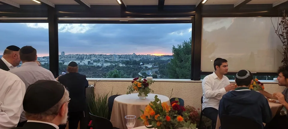 A rooftop celebration at sunset