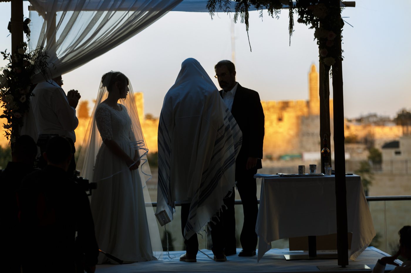 A wedding ceremony at sunset